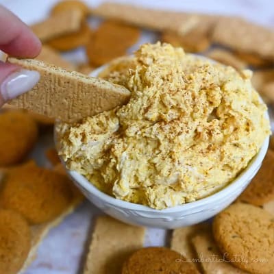 bowl of pumpkin fluff dip with graham crackers