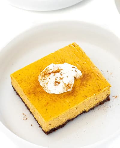 pumpkin cheesecake bar with whipped topping