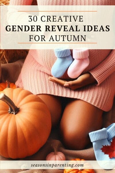 fall baby shower ideas: pregnant woman in pink dress holding pink and blue booties surrounded by fall flowers and pumpkins