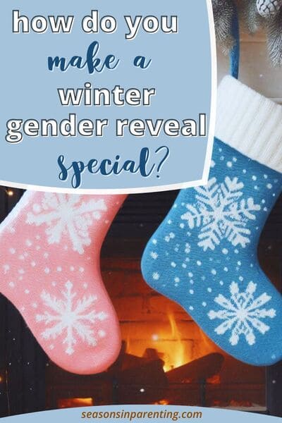 winter gender reveal ideas: pink and blue stockings hanging from a fireplace