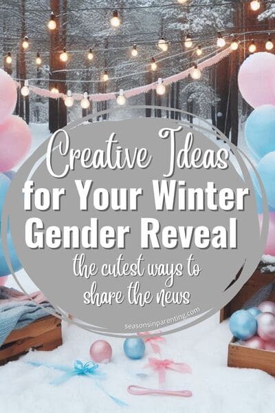 winter gender reveal ideas: two columns of pink and blue balloons in the snow with string lights hanging above