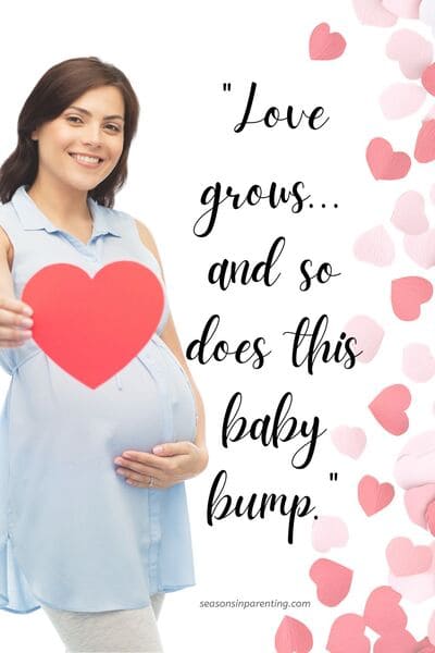 Valentine's baby announcement quotes: pregnant woman holding a cut out heart with quote