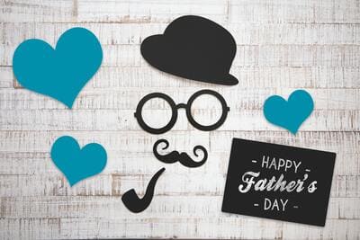 Father's Day card with face and heart cutouts and 